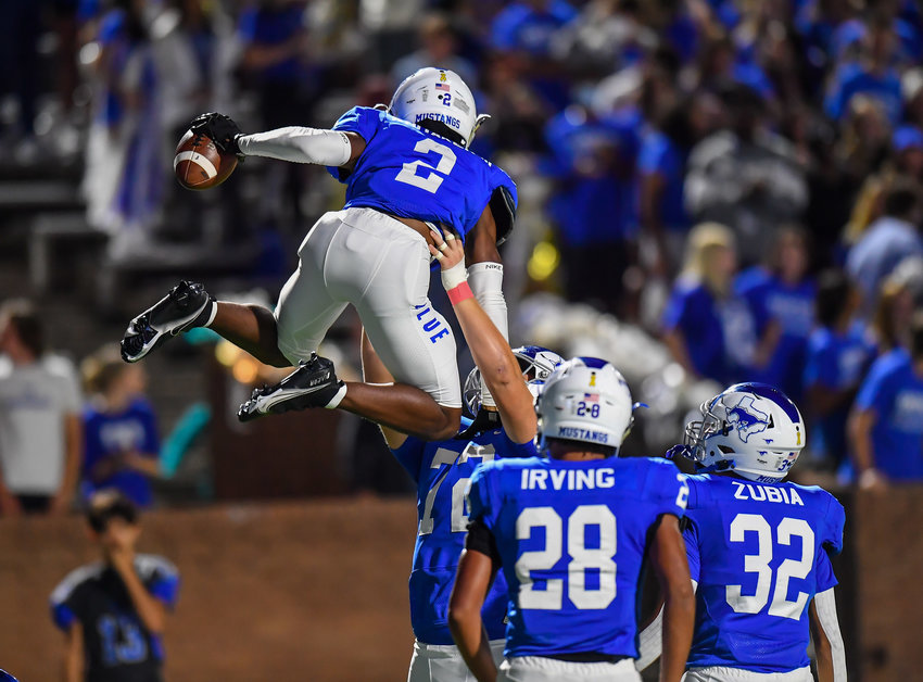 Katy, Tx. Oct. 15, 2021: Katy Taylors Michael Whitaker iii #2  celebrates a TD during a conference game between Mayde Creek and Katy Taylor at Rhodes Stadium. (Photo by Mark Goodman / Katy Times)
