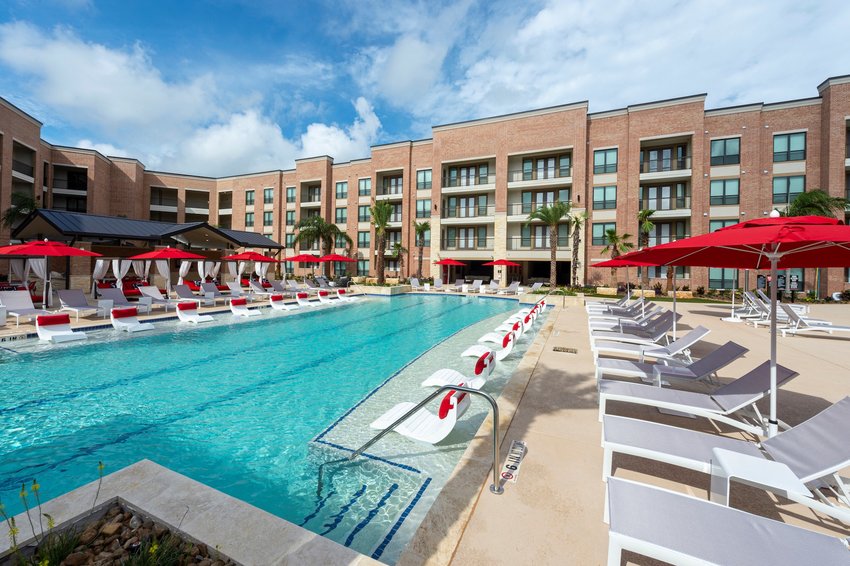 The 319-unit Boardwalk Lofts apartment complex has opened near Katy Mills. The complex features a pool surrounded on four sides by a four-story apartment building with additional amenities.