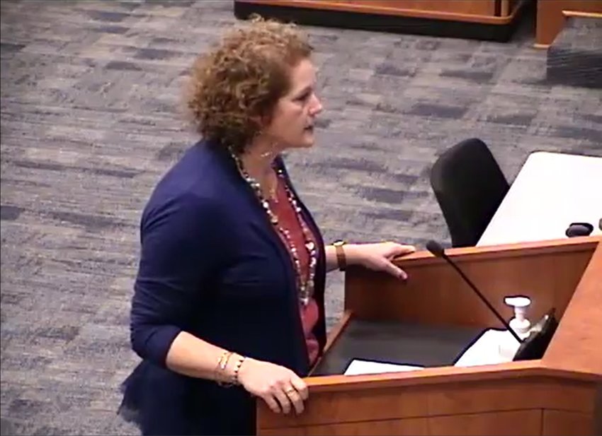Mary Ellen Cuzela, a Katy Independent School District substitute teacher, speaks at Monday&rsquo;s Board of Trustees meeting.