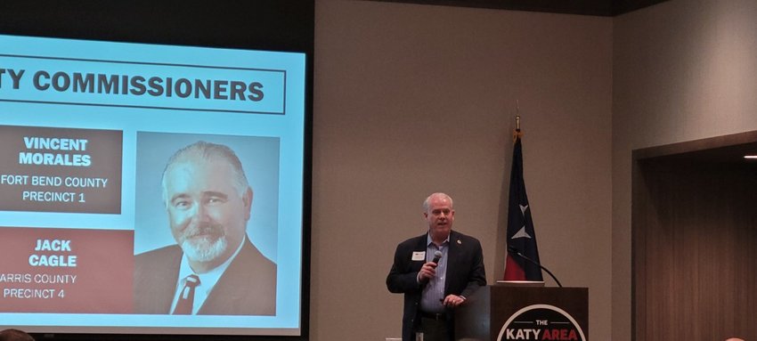 Fort Bend County Pct. 1 Commissioner for Precinct One Vincent Morales speaks about the impact of redistricting on county residents and government offices during a Dec. 16 event hosted by the Katy Area Chamber of Commerce. He and Harris County Pct. 4 Precinct Four Commissioner R. Jack Cagle, pictured in the slide presentation, said partisan efforts on the part of Democrats in both counties had effectively gerrymandered the counties to favor Democratic candidates in addition to costing taxpayers large amounts of money for office moves and other logistical expenses.