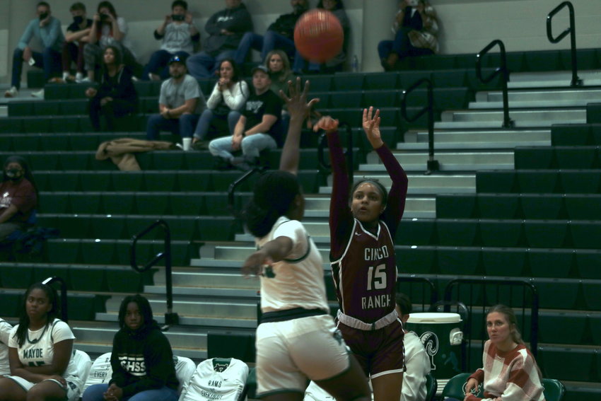 Cinco Ranch&rsquo;s Danielle Williams shoots a floater during Friday&rsquo;s District 19-6A game against Mayde Creek at the Mayde Creek gym.