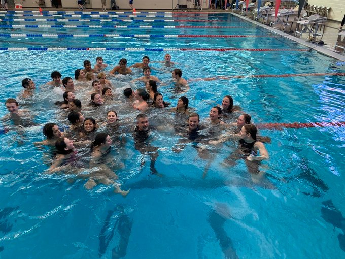 The Jordan boys and girls swimming and diving teams celebrate after sweeping first place at the District 21-5A meet on Saturday.