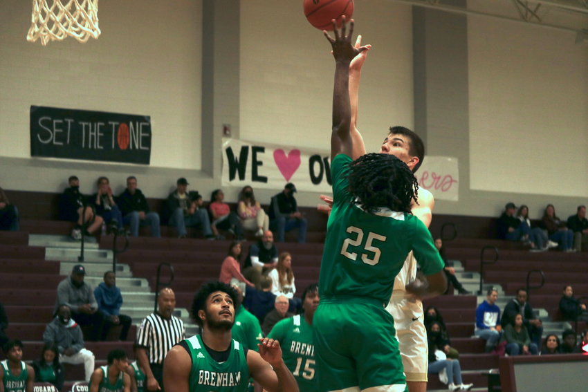 Jordan&rsquo;s Trevor Martz shoots a hookshot over a defender during Saturday&rsquo;s game against Brenham at the Cinco Ranch gym.
