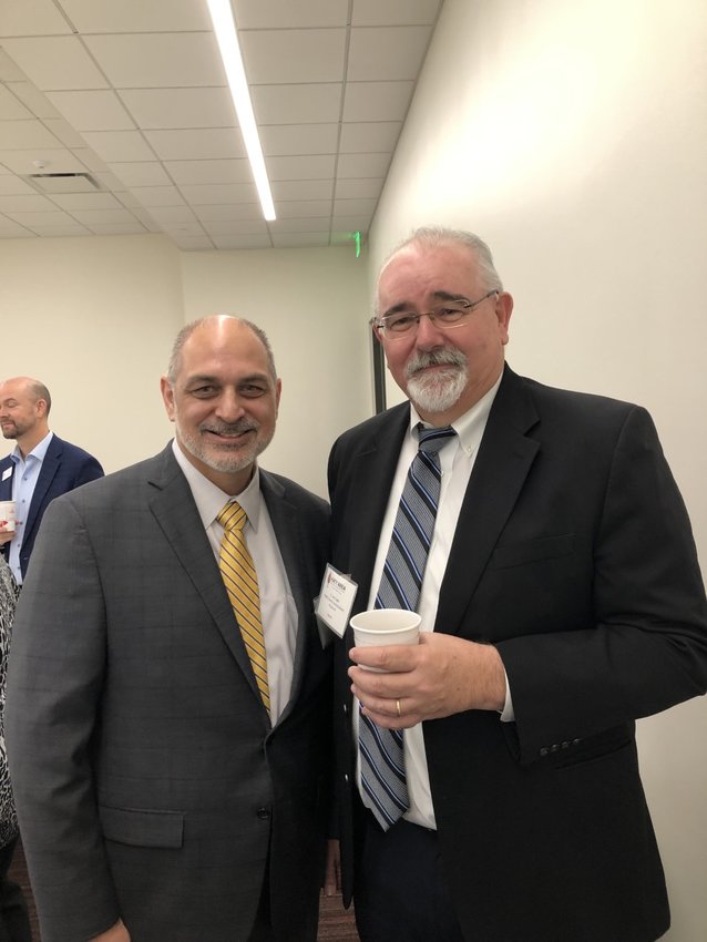 Katy Area Economic Development Council President/CEO Chuck Martinez poses with Harris County Pct. 4 Commissioner R. Jack Cagle Tuesday morning.