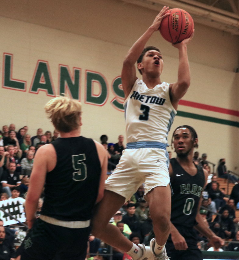 Kam Ingram shoots a floater during Monday&rsquo;s game between Paetow and Kingwood Park at The Woodlands High School.