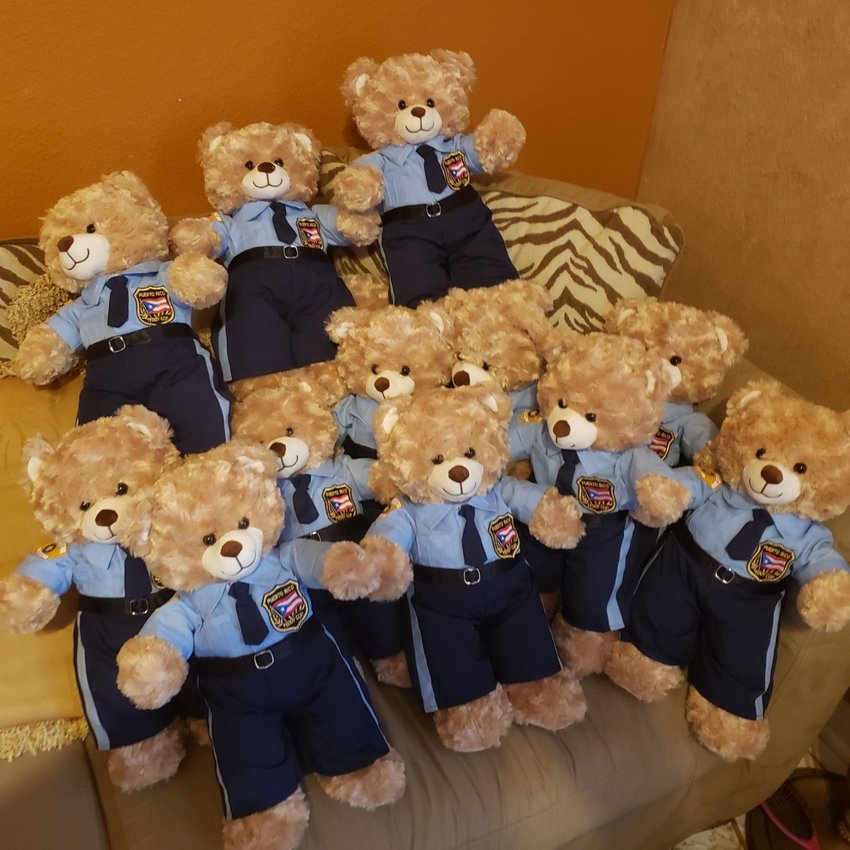 A squad of Teddy Cops, complete with Puerto Rican identification, will be distributed to Puerto Rican special needs schoolchildren.