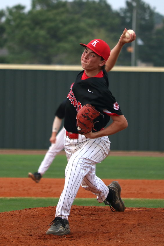 Lucas Moore pitches during Tuesday&rsquo;s District 19-6A game between Katy and Tompkins at the Tompkins baseball field.