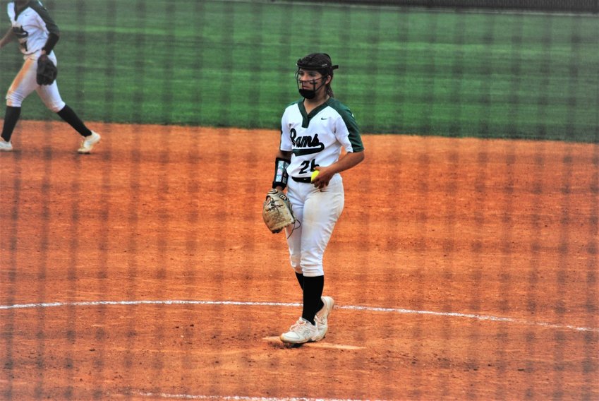 Alyssa Gonzalez prepares to pitch during a game between Mayde Creek and Seven Lakes.