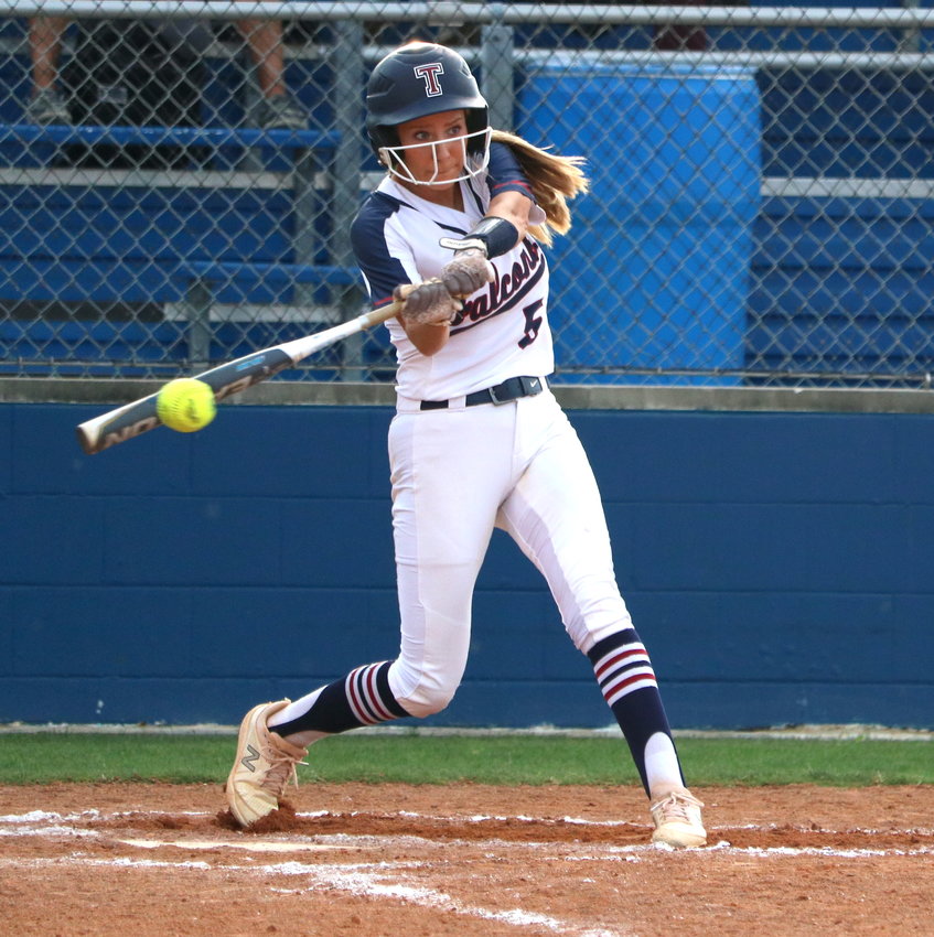 Madison Besselman hits during Thursday&rsquo;s bi-district game between Tompkins and George Ranch at the Tompkins softball field.