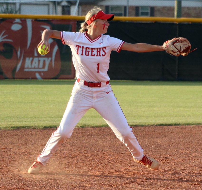 Peyton Watson throws the ball to first base during Wednesday&rsquo;s Class 6A Regional Semifinal game between Katy and Pearland at the Katy softball field.