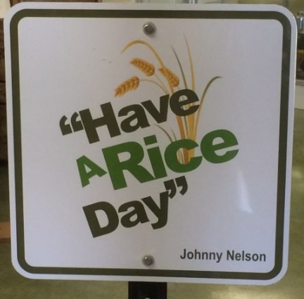 The late Mayor Johnny Nelson was known for his &quot;Have a Rice Day&quot; saying, which was reproduced for a sign at the heritage museum named in his honor.