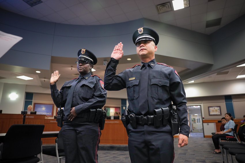 wo new Katy ISD police officers, Doreen E. Duclair, left, and Vinh Q. Pham, took their oaths of office at Monday&rsquo;s trustees meeting.