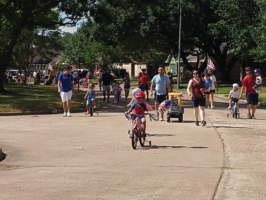 Residents of the Nottingham Country neighborhood celebrated Independence Day with a bike parade. A fire engine from HCESD 48 led the way for participants of all ages, with patriotic music in the background. Two Harris County Pct. 5 constables brought up the rear.