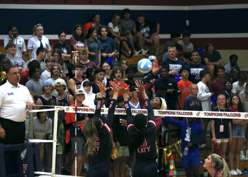 Tompkins Cindy Tchouangwa spikes a ball during Tuesday&rsquo;s match between Tompkins and Katy at the Tompkins gym.
