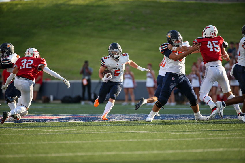 Seven Lakes Spartans running back Barrett Hudson (5) runs in the first quarter during the game between the Seven Lakes Spartans and Memorial Mustangs on August 25, 2022 in Houston, Texas. Photo Credit: John Glaser - Katy Times
