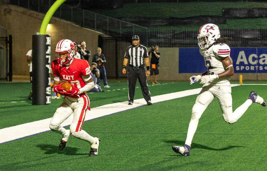 Katy&rsquo;s Micah Koenig catches a touchdown pass during a game between Katy and Atascocita at Legacy Stadium.