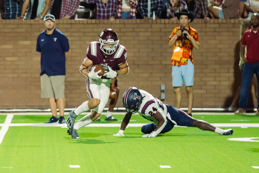 Cinco Ranch&rsquo;s Seth Salverino breaks upfield after a catch during Friday&rsquo;s game between Cinco Ranch and Tompkins at Rhodes Stadium.