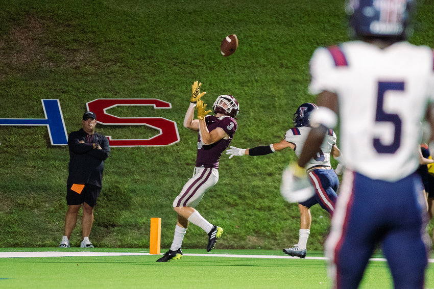 Cinco Ranch&rsquo;s Seth Salverino makes a catch for a touchdown during Friday&rsquo;s game between Cinco Ranch and Tompkins at Rhodes Stadium.