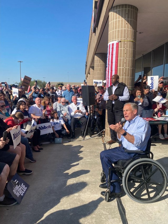 Gov. Greg Abbott spoke at an October 27 rally in front of Fuzzy&rsquo;s Pizza and Italian Caf&eacute;, 613 S. Mason Road.