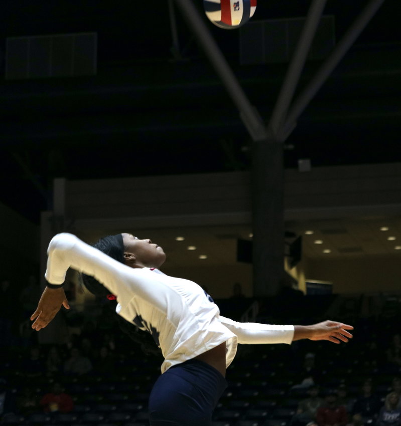 Cindy Tchouangwa spikes a ball during Friday's Class 6A State Semifinal between Tompkins and Keller on Friday at the Curtis Culwell Center in Garland.