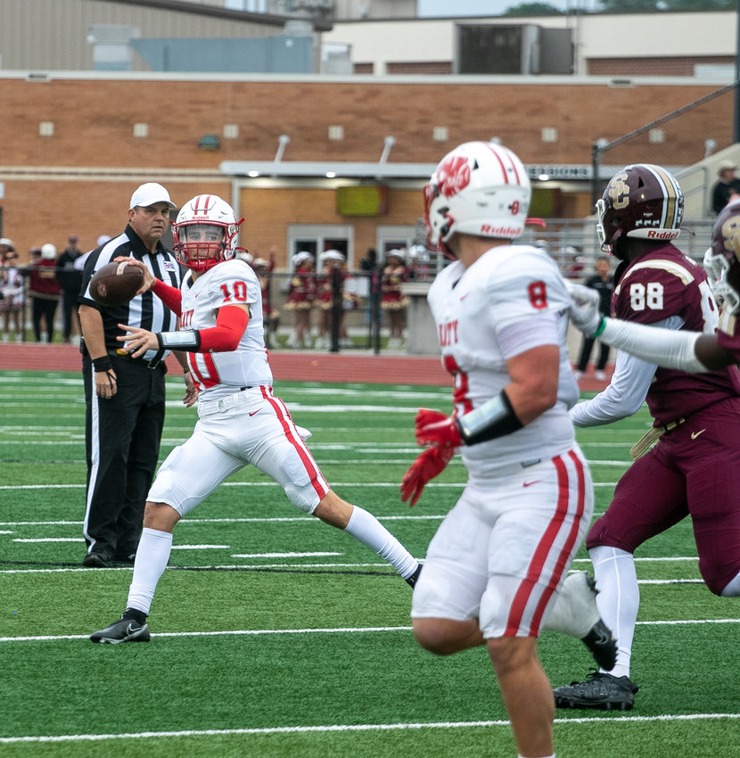 Caleb Koger throws a pass during Friday's Class 6A-Divison II Region III Semifinal at Turner Stadium.