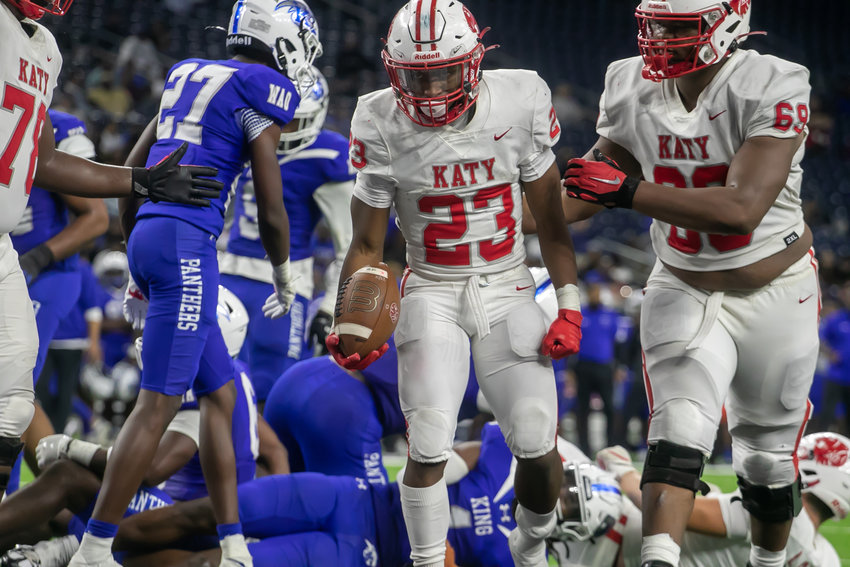 Seth Davis scores a touchdown during Friday's Class 6A-Division II Region III Final between Katy and C.E. King at NRG Stadium.