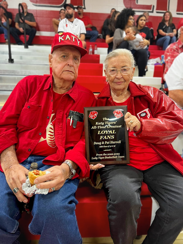 The Katy High Lady Tigers basketball team honored longtime Katy residents Doug and Pat Harrell for their support.