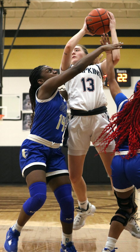 Macy Spencer shoots while being fouled during Monday&rsquo;s game between Tompkins and Elkins at the Jordan gym.