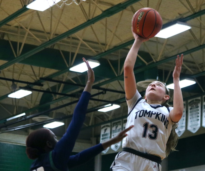 Macy Spencer shoots a layup during Friday&rsquo;s game between Tompkins and Cy-Ridge at the Mayde Creek gym.