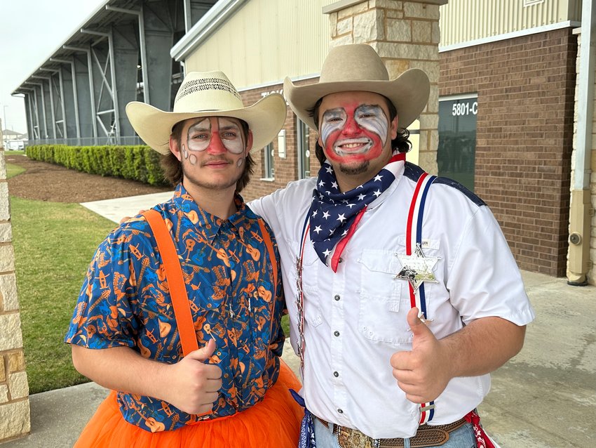 Andrew Horner, left, and Preston Brown (who are seniors at Tompkins High) dress up as rodeo clowns at the Feb. 15 special rodeo at the Gerald D. Young Agricultural Sciences Center. Horner plans to attend the University of Louisiana-Monroe, major in kinesiology and play football. Brown plans to attend Oklahoma State University and major in aviation education.