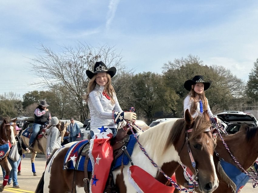 Molly Maher of the Texas Cowgirls rides her paint horse, Tex, in the Feb. 18 Katy Rodeo Parade.