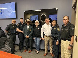 Fort Bend County Sheriff Eric Fagan, in hat, and his department worked with Harris County Sheriff&rsquo;s deputies and Katy city officials, including Ward A Council Member Janet Corte, center, and Police Chief Noe Diaz, fifth from left, to expand the Project Lifesaver program.