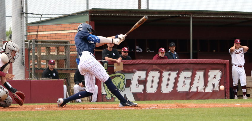 Cooper Markle hits during a game between Tompkins and Cinco Ranch at the Cinco Ranch baseball field.