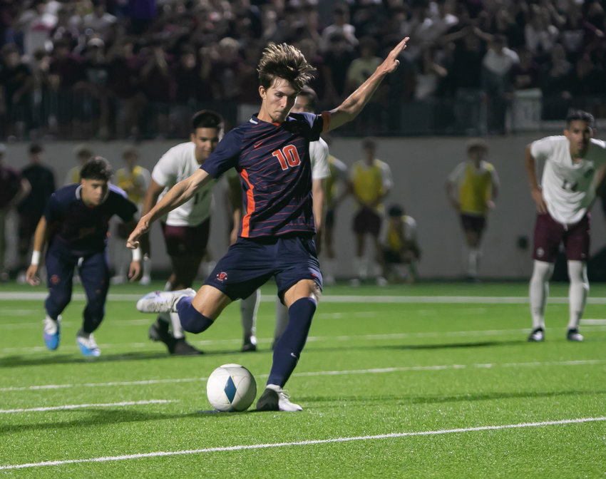 Aidan Morrison takes a penalty kick during a Class 6A Regional Quarterfinal game between Seven Lakes and Cinco Ranch at Legacy Stadium.