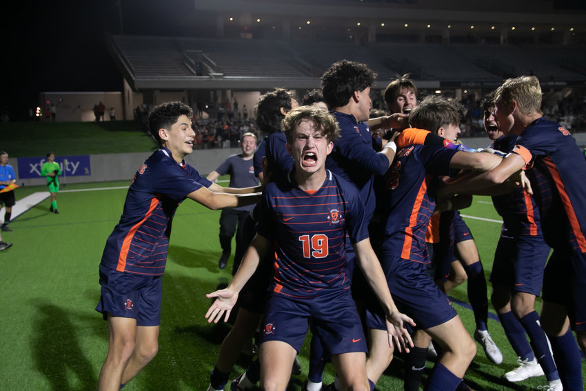Seven Lakes players celebrate after winning a Class 6A Regional Quarterfinal game between Seven Lakes and Cinco Ranch at Legacy Stadium.