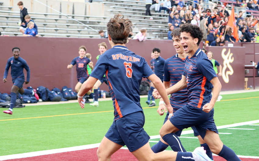 Kortay Koc, Abdullah Soliman and Noa Stasic celebrate after a Koc goal during Saturday's Region III Class 6A Final between Seven Lakes and Dobie at Abshier Stadium in Deer Park.