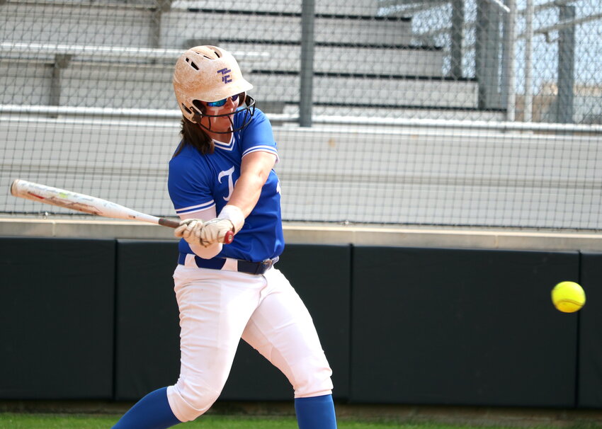 Katelyn Wentzler hits during Monday's play in game between Taylor and Seven Lakes at the Jordan softball field.