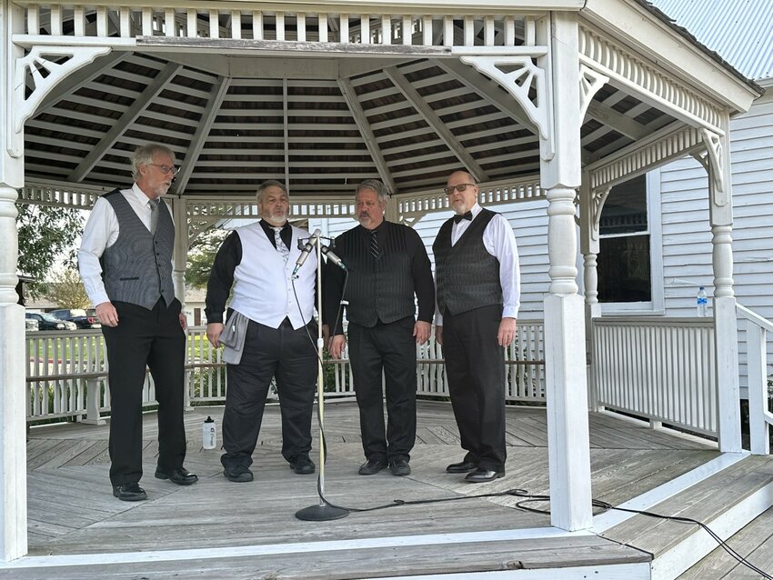 The S.L.E.D. Quartet, an A Cappella quartet, performed May 4 at a Katy city celebration at Katy Heritage Park honoring the Waller County sesquicentennial. A part of the City of Katy falls in Waller County. Randy Rensi, a singer with the group, said the &ldquo;S.L.E.D.&rdquo; acronym has different meanings, developed over the years, based on the song being performed at the moment. Rensi is at left; he sings bass. With him are, from left, Clarke Bean, baritone; Fred Leash, lead, and Allan Quiat, tenor.