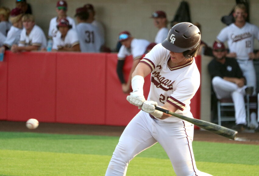 Ethan Muniz hits during an area round game between Cinco Ranch and Memorial at Cy-Lakes.