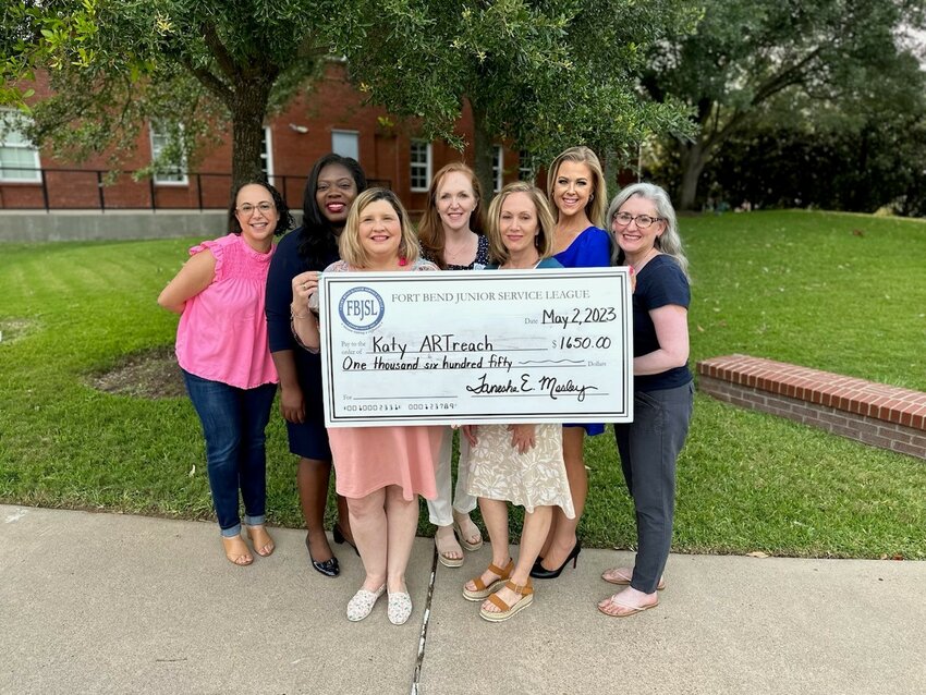The Fort Bend Junior Service League awarded a $1,650 grant to ARTreach. Pictured on front row, left to right, are league member Dana Lopera and ARTreach member Nicole Moraw. On back row, left to right, are Monica Brown, Jennifer Small, Jennifer Semeyn, Kelsea Weatherford and Alexis Geissler.