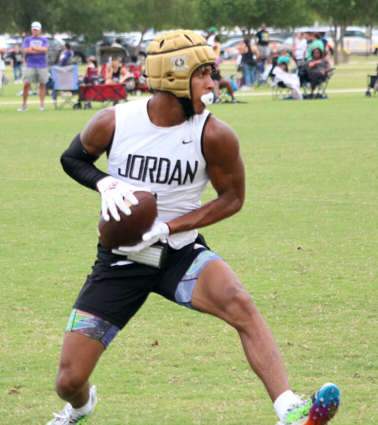 Zechariah Sample makes a catch during Saturday's state 7-on-7 game between Jordan and Klein Cain at Veterans Memorial Park in College Station.