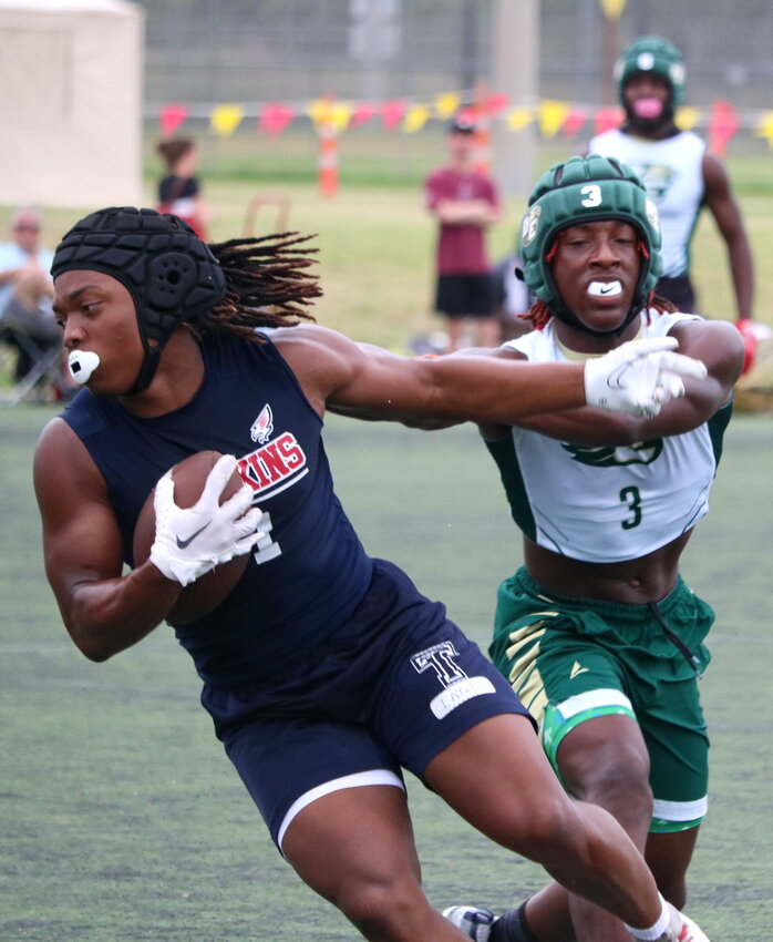 Caleb Blocker spins away from a defender during last year's state 7-on-7 game between Tompkins and DeSoto at Veterans Memorial Park in College Station.