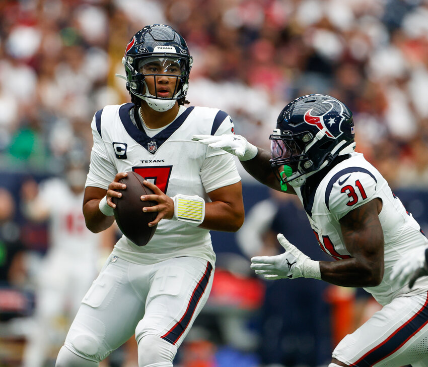 Texans quarterback C.J. Stroud (7) looks to pass the ball during an NFL game between the Texans and the Colts on September 17, 2023 in Houston. The Colts won, 31-20.