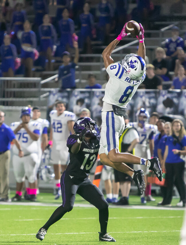 Cyrus Reyes intercepts a pass during Thursday's game between Taylor and Morton Ranch at Legacy Stadium.