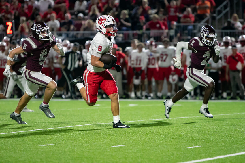Chase Johnsey runs into the endzone during Thursday's game between Katy and Cinco Ranch at Legacy Stadium