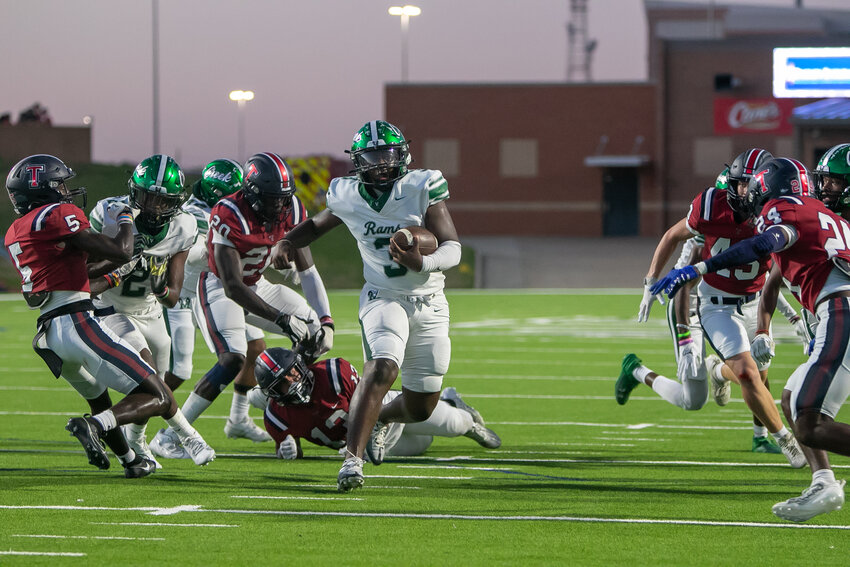 Trey Williams runs the ball during Friday's game between Tompkins and Mayde Creek at Rhodes Stadium