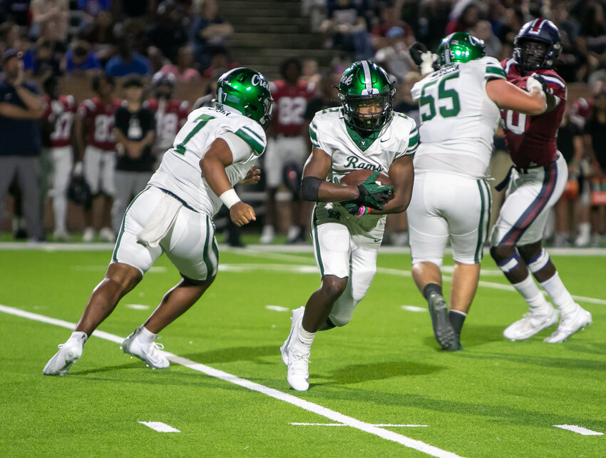 Christian Bradford carries the ball during Friday's game between Tompkins and Mayde Creek at Rhodes Stadium