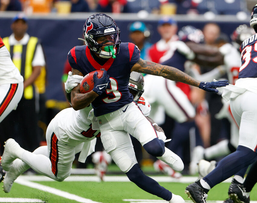 Texans wide receiver Tank Dell (3) carries the ball after a catch during an NFL game between the Houston Texans and the Tampa Bay Buccaneers on November 5, 2023 in Houston.