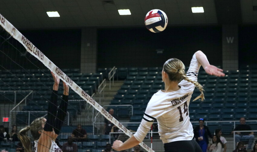 Emily Killam spikes the ball during Tuesday&rsquo;s match between Cinco Ranch and Cy-Fair at the Merrell Center.