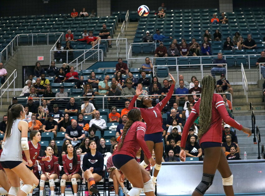 Tompkins&rsquo; Christian Cowart spikes the ball during a match between Seven Lakes and Tompkins at the Merrell Center.